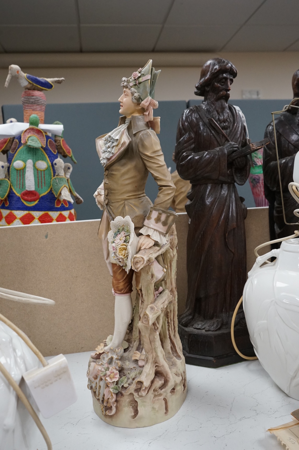 A large Royal Dux figure of a gent, 60cm